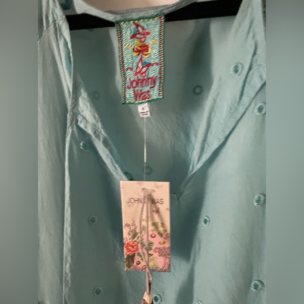 Johnny was peasant blouse . Beautiful baby blue